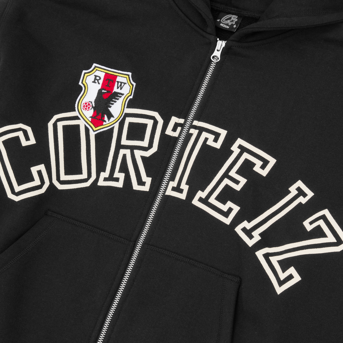 ARCH SHIELD ZIP HOODIE [BLACK]